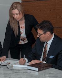 Firm's Attorneys discussing