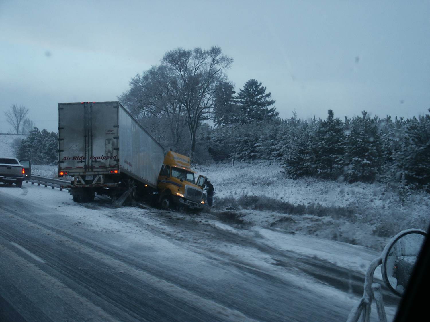 snowy semi-truck accident
